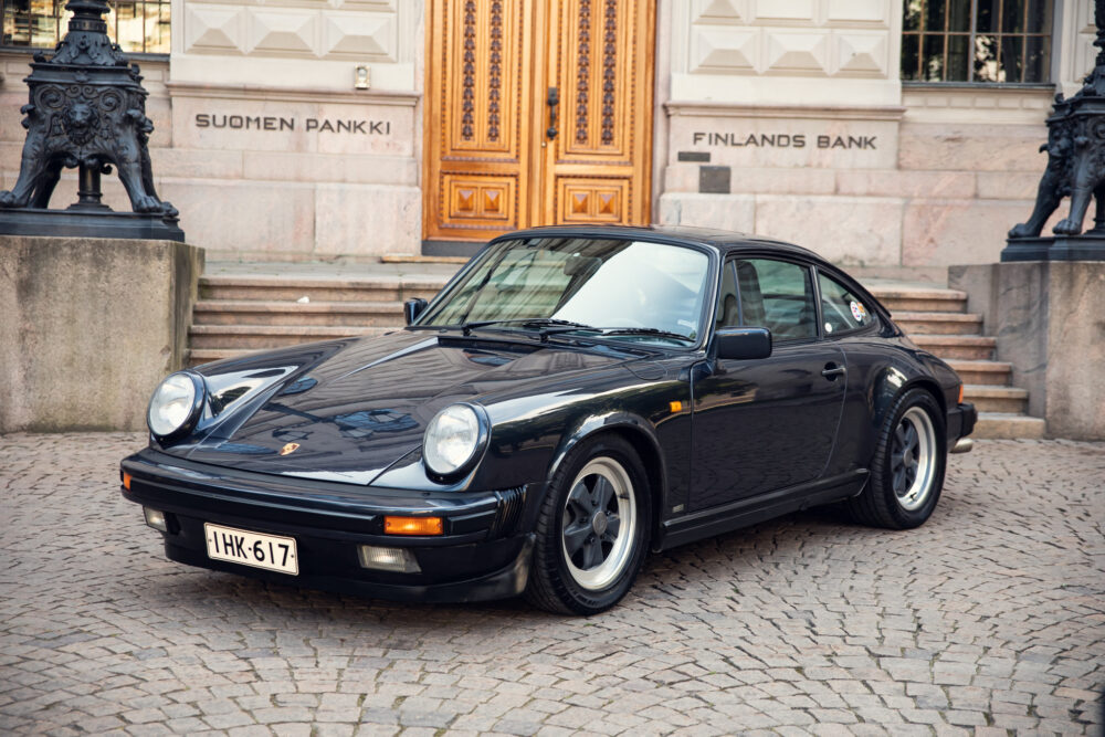 Vintage Porsche 911 parked outside Finland's Bank