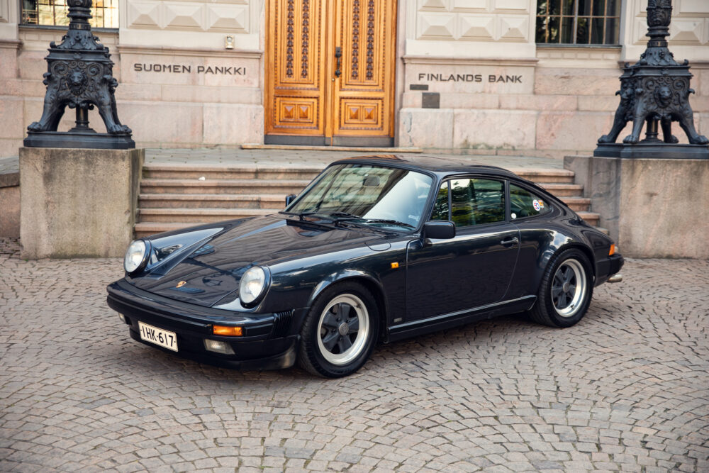 Vintage Porsche parked in front of Finland's Bank