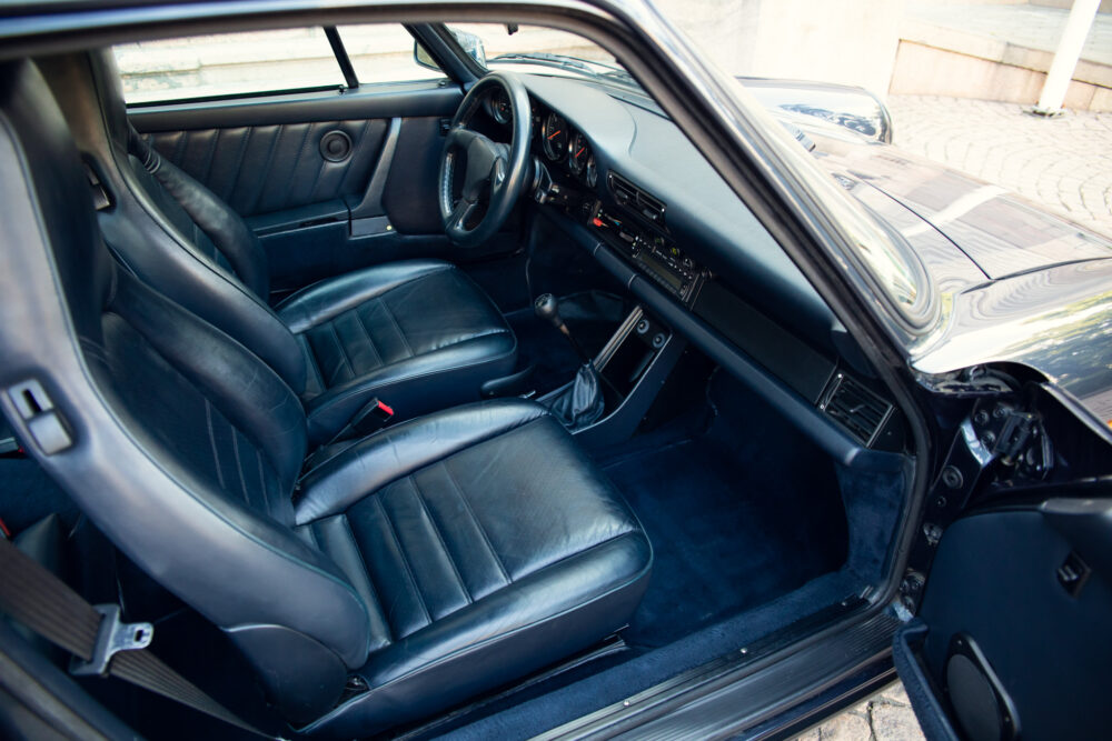 Vintage car interior with leather seats and dashboard