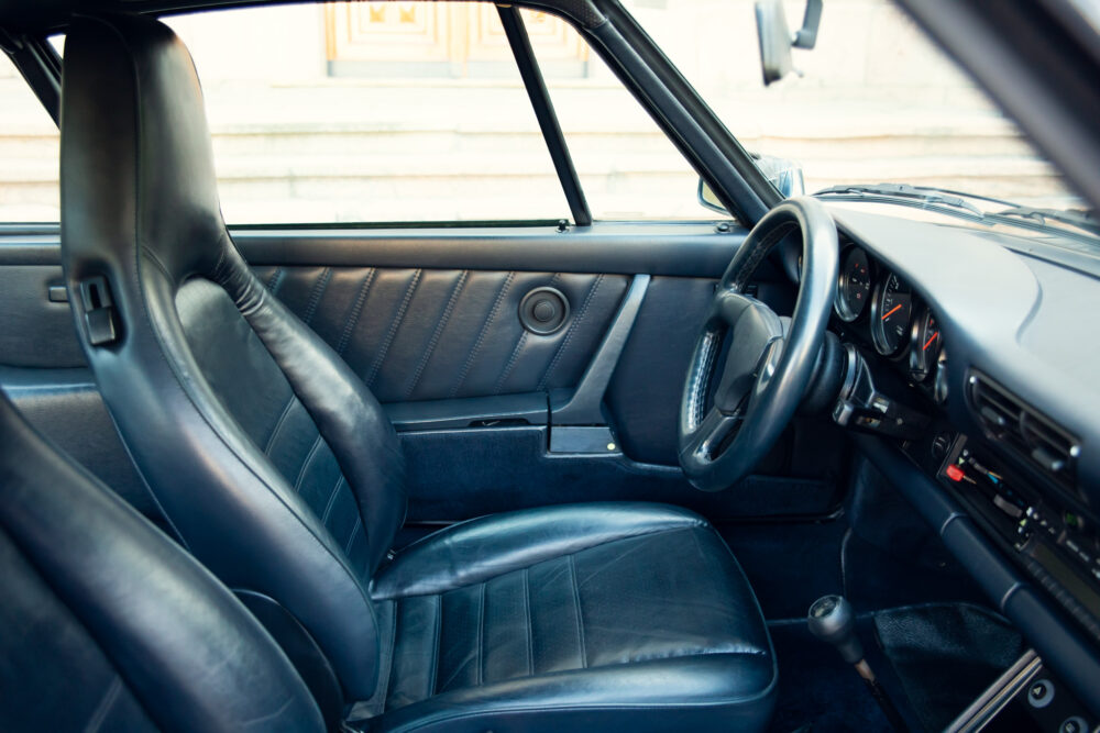 Vintage car interior with leather seats and dashboard