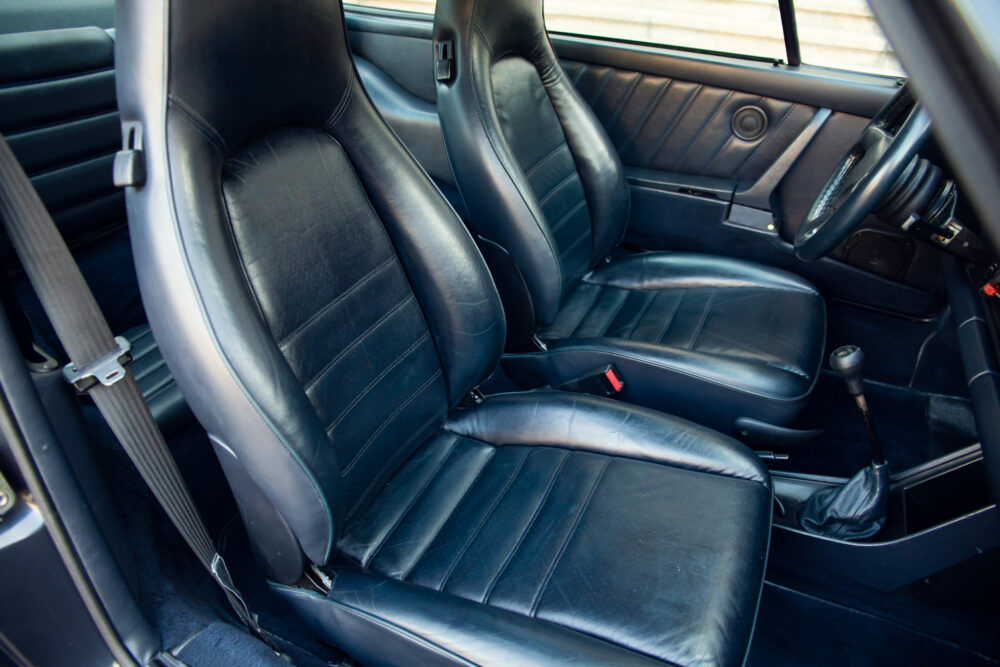 Black leather interior of a classic car
