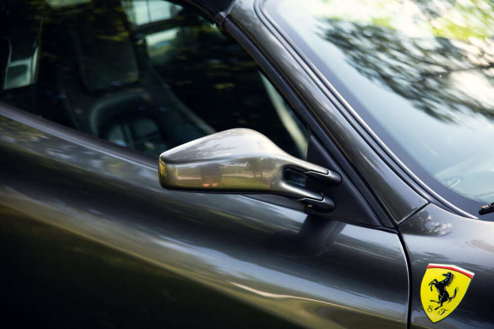 Luxury car side mirror with logo