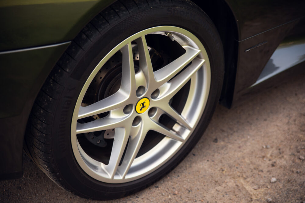 Ferrari car wheel close-up with logo