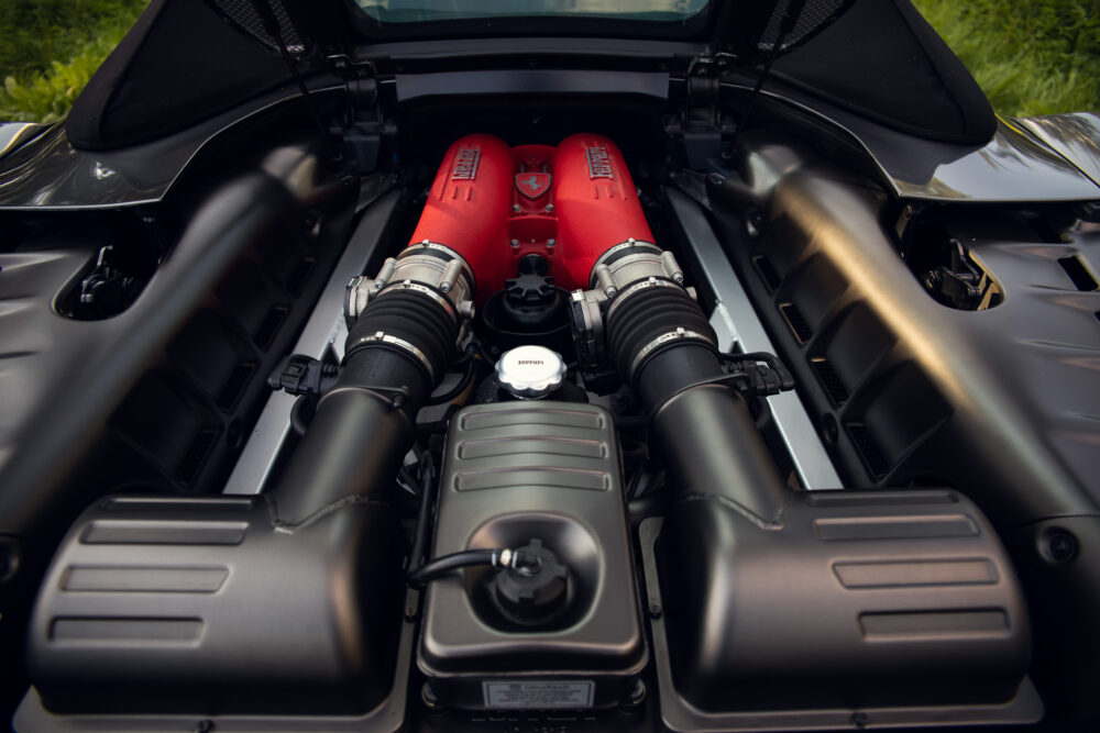 Red sports car engine close-up view