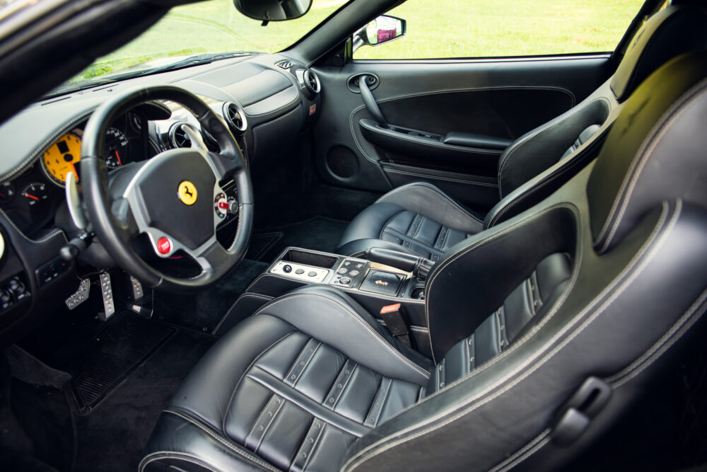 Luxurious Ferrari interior with leather seats and dashboard