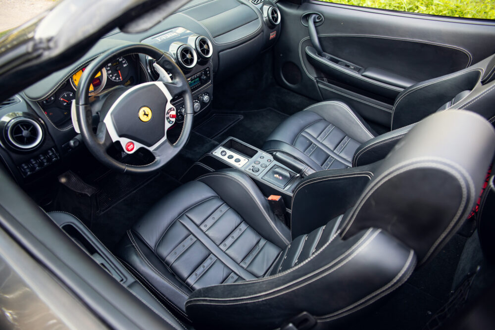 Luxury sports car interior with leather seats and dashboard