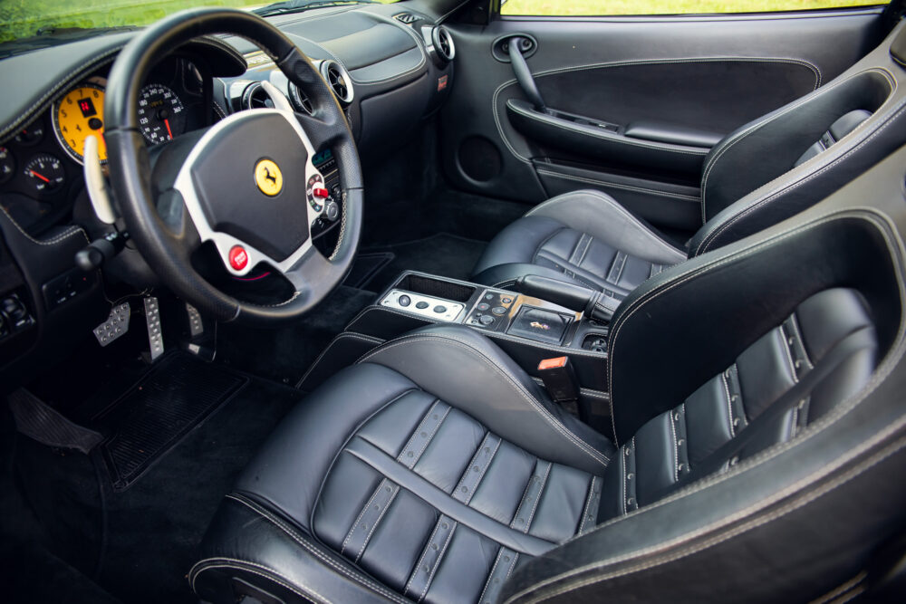 Luxury Ferrari interior with leather seats and dashboard