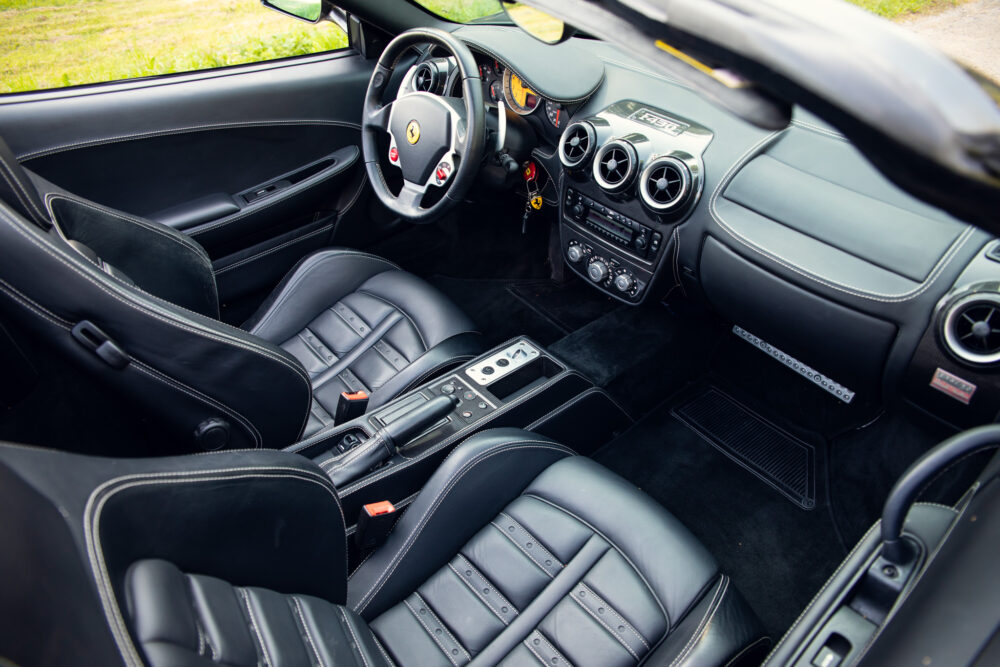 Luxurious black leather interior of a sports car