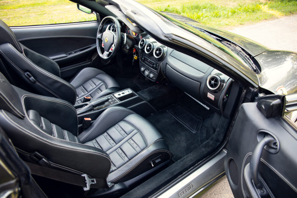 Luxury sports car interior with sleek black leather seats