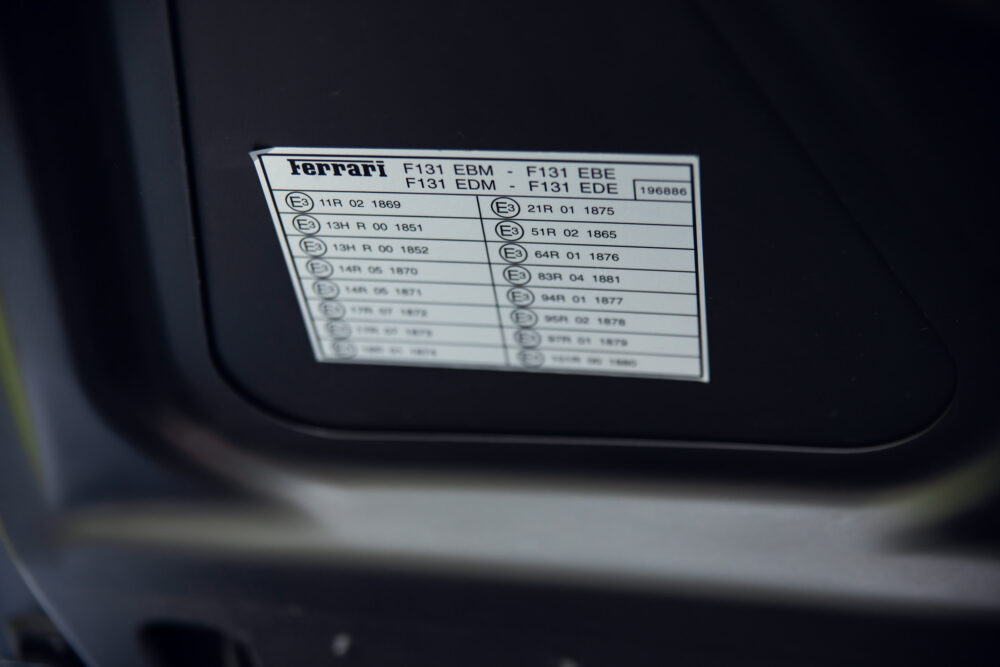 Ferrari vehicle identification sticker close-up