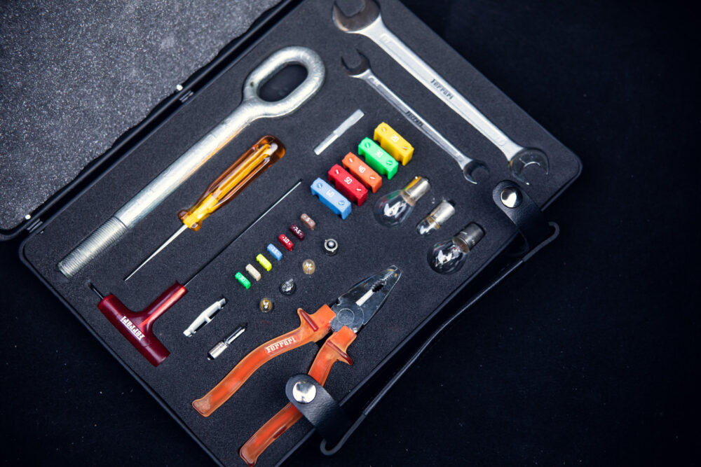 Assorted precision tools neatly arranged in a carrying case