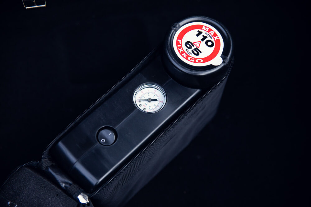 Compact black air pump with pressure gauge