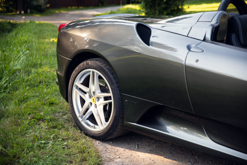 Silver convertible sports car parked outdoors