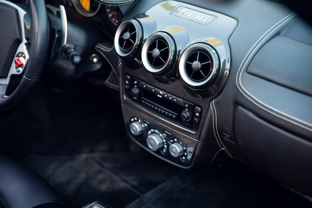 Luxury car dashboard with modern circular air vents