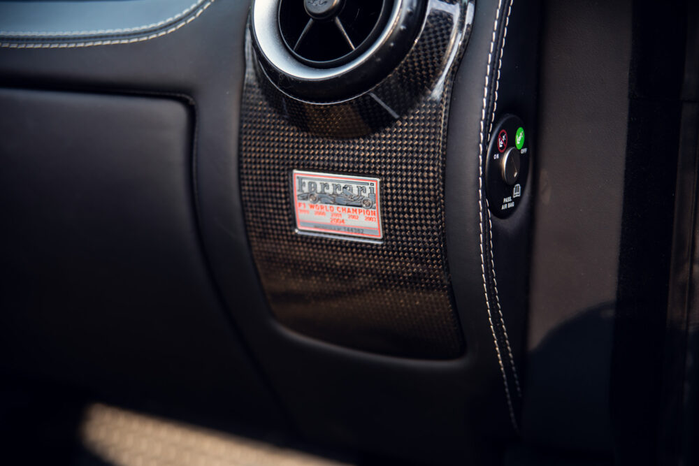Ferrari carbon fiber panel with championship plaque