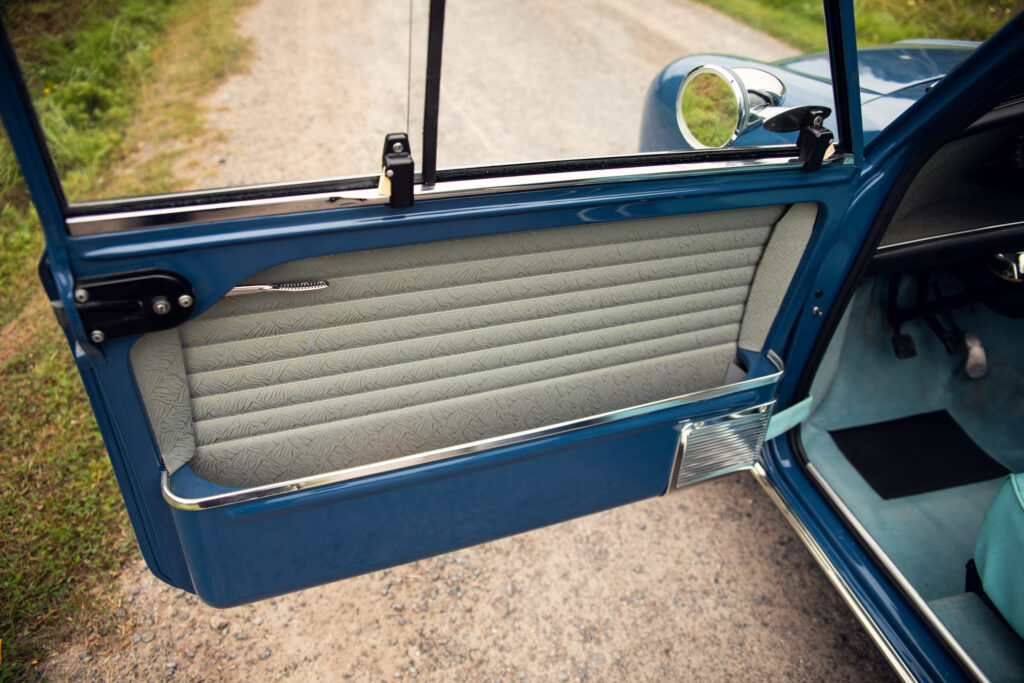 Vintage blue car door and patterned interior detail