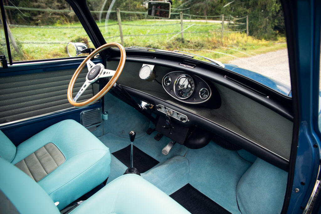 Vintage car interior with wooden steering wheel