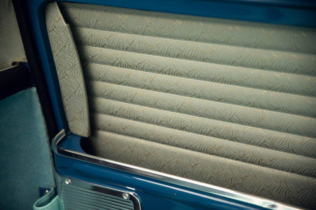 Vintage car blue interior with patterned seat upholstery