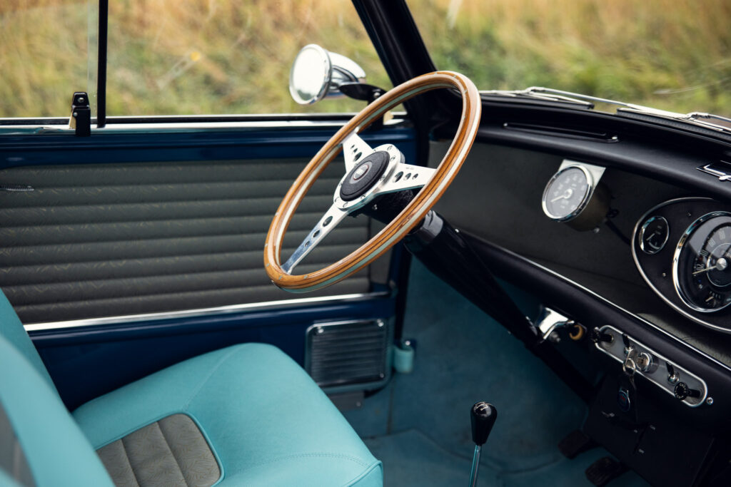 Vintage car interior with wooden steering wheel