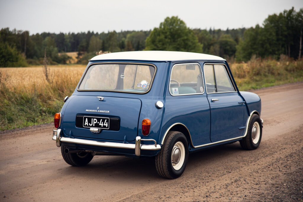 Vintage blue Morris Cooper car on rural road