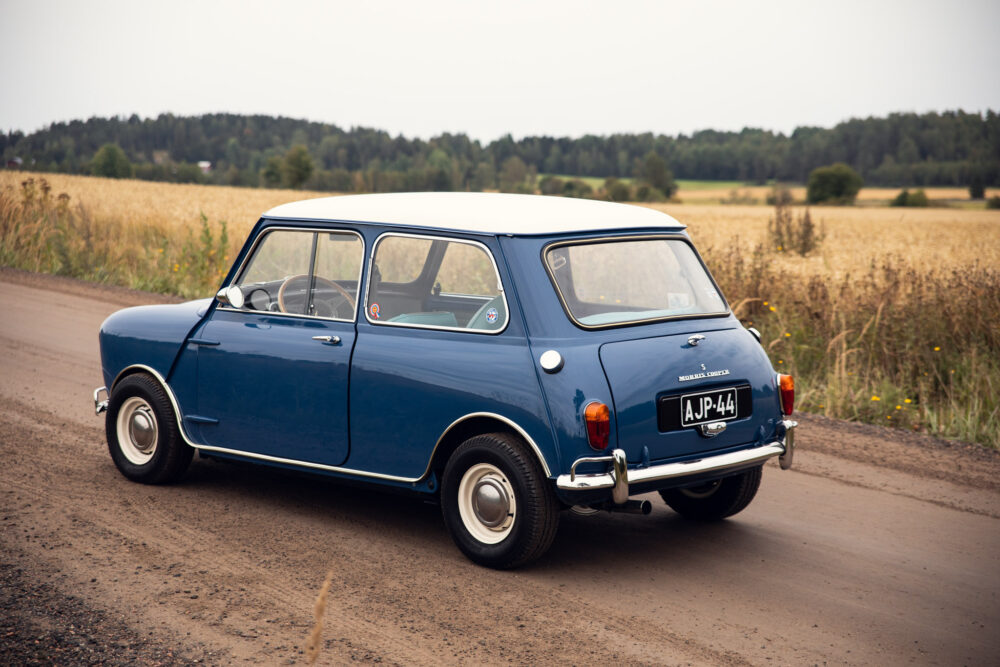 Vintage blue Morris Cooper on countryside road
