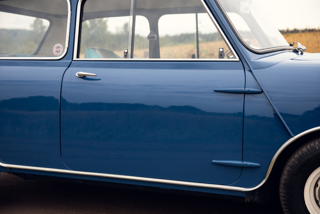 Side view of a classic blue car
