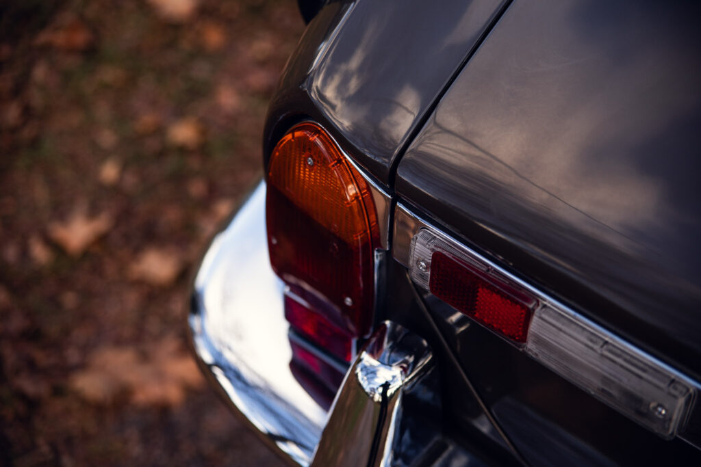 Close-up of vintage car's rear corner and taillight