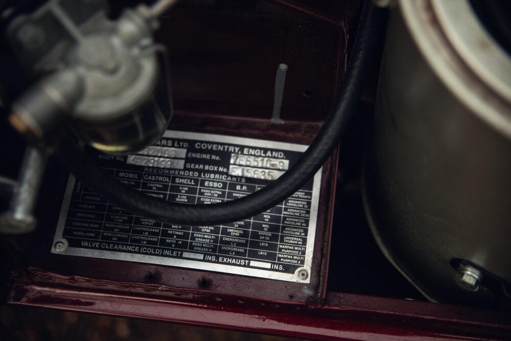 Vintage car lubricant recommendation plaque, close-up view