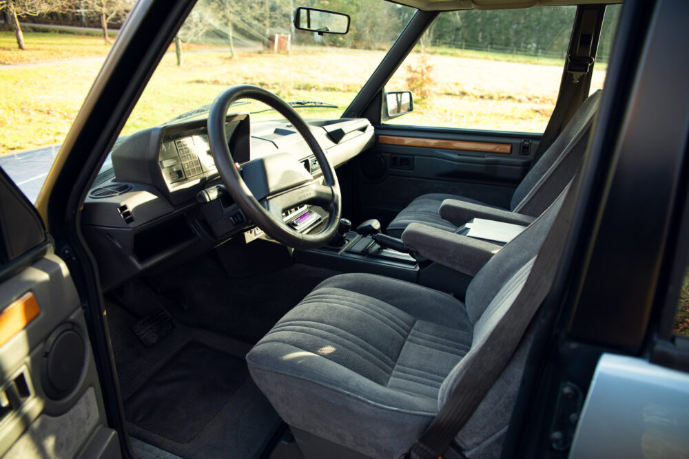 Vintage car interior with steering wheel and dashboard