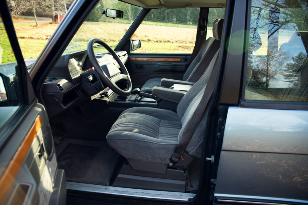 Vintage car interior, driver's seat and dashboard view