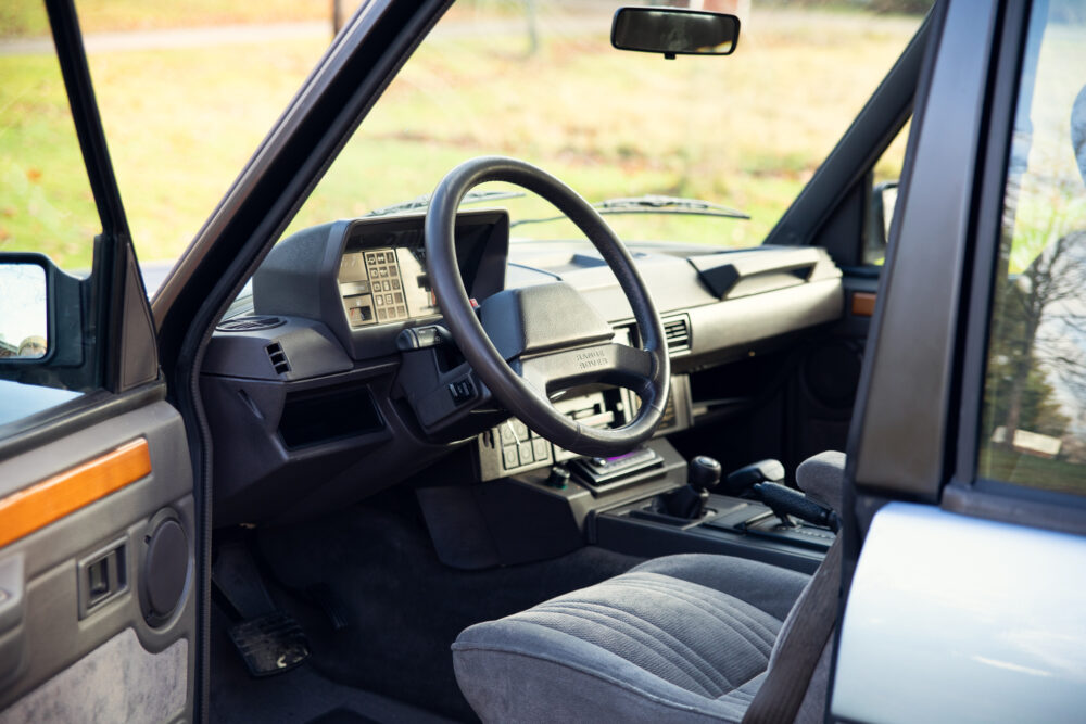 Vintage car interior with steering wheel and dashboard
