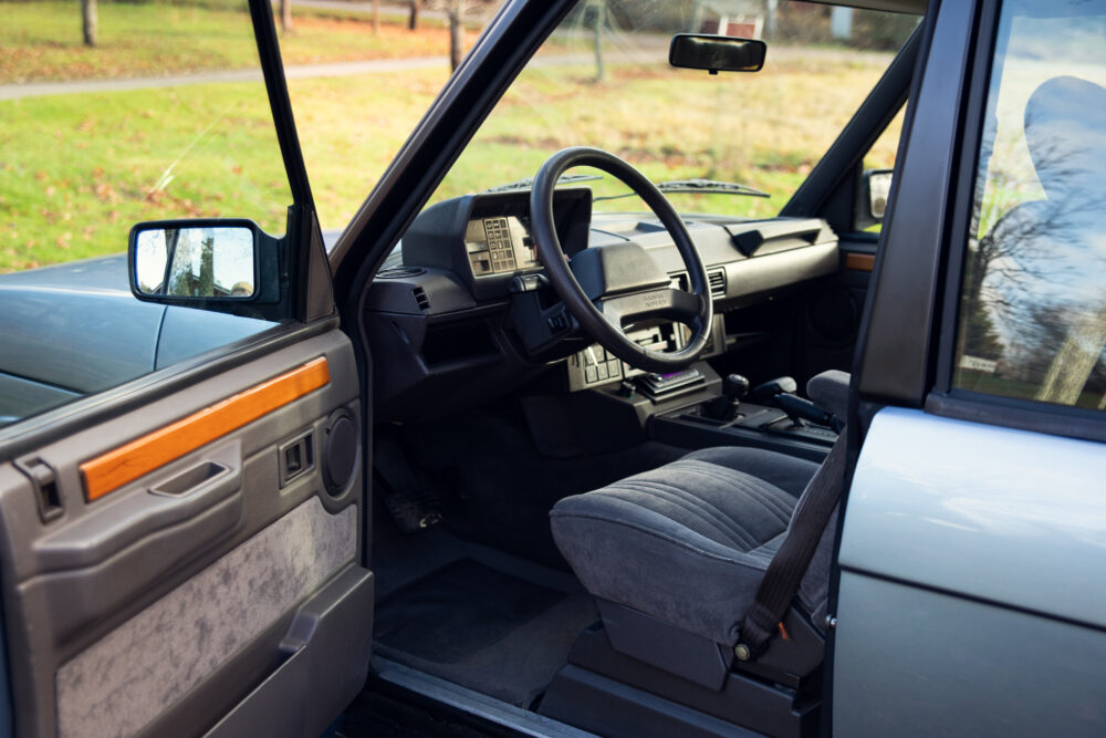 Vintage car interior, steering wheel and dashboard