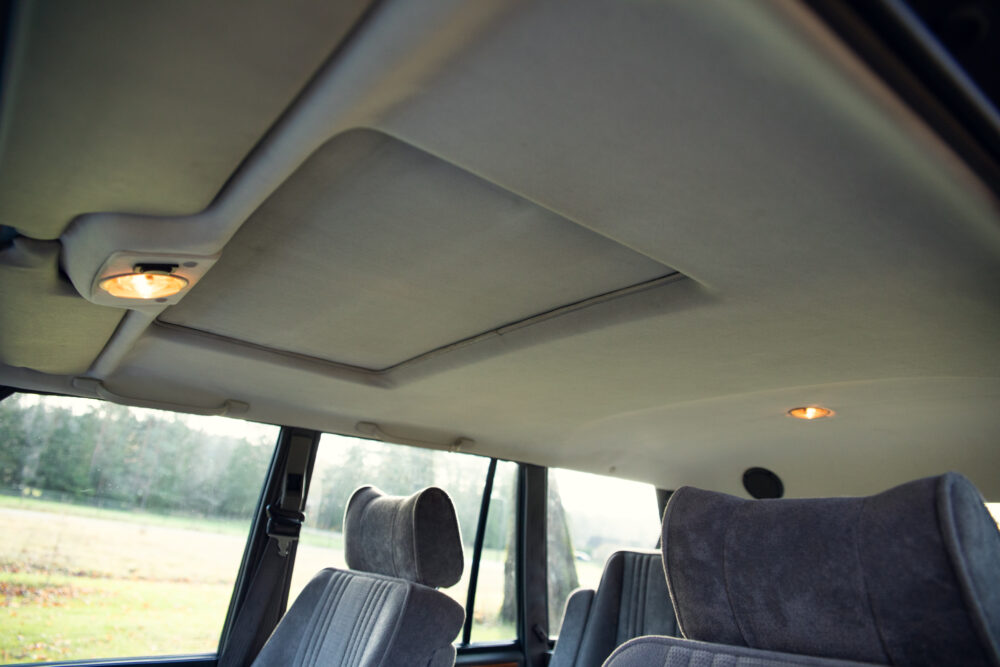 Interior view of vehicle ceiling and seats