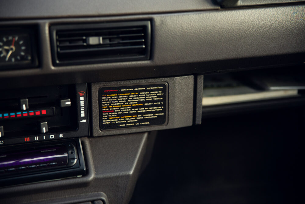 Car transfer gearbox information label on dashboard
