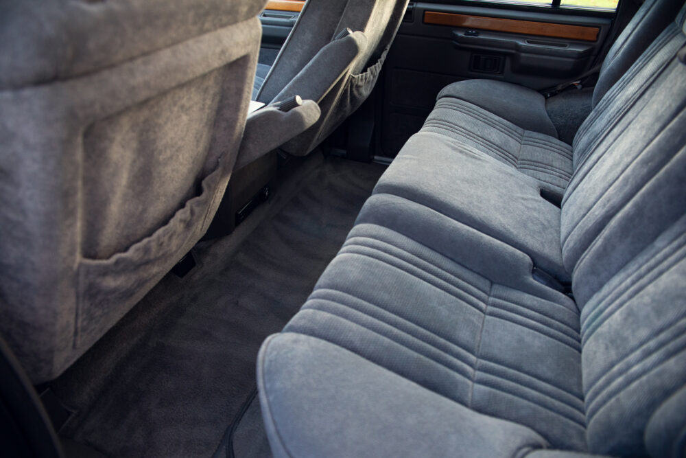 Luxury car interior with spacious gray seats