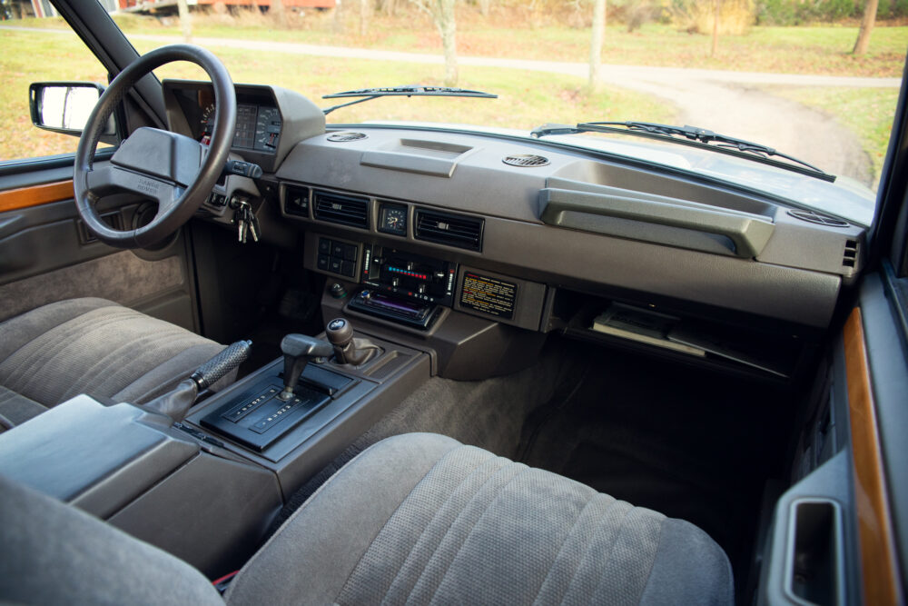 Vintage car interior with dashboard and steering wheel