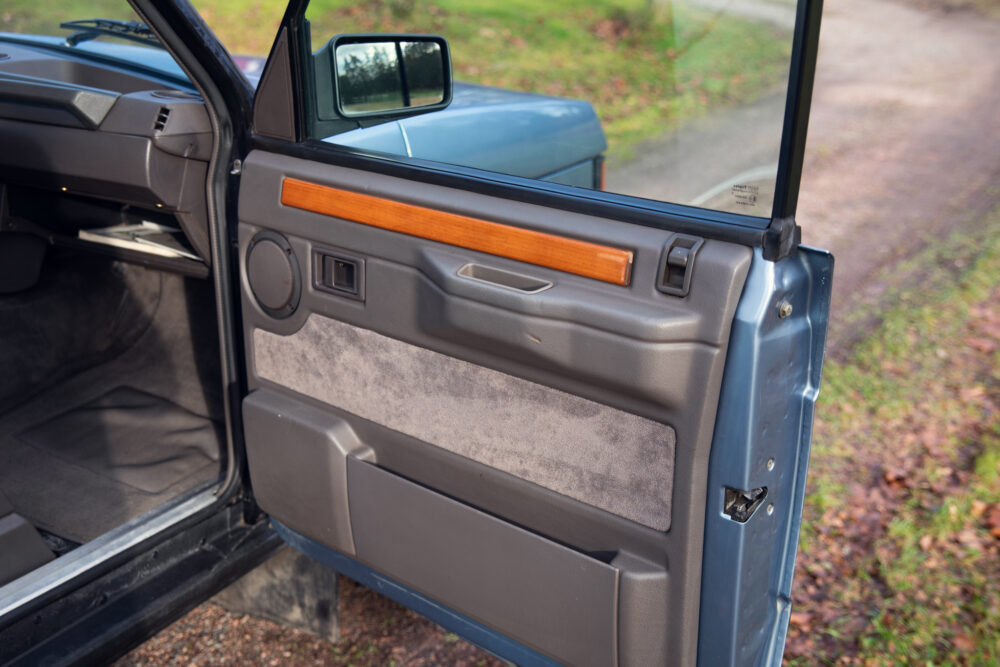 Vintage car door interior with wooden trim
