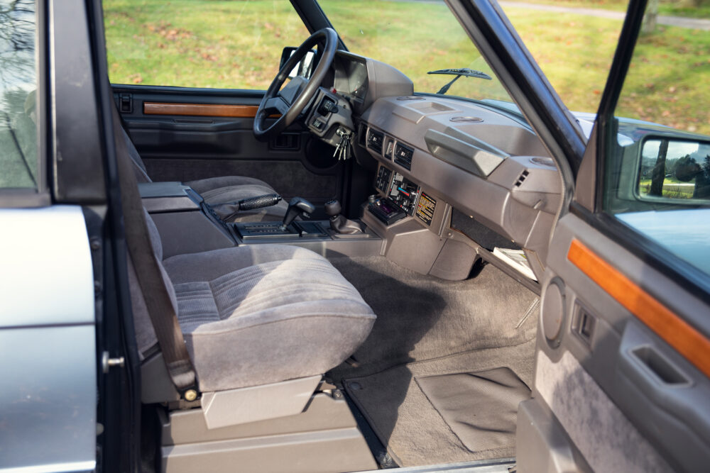 Vintage car interior with steering wheel and dashboard