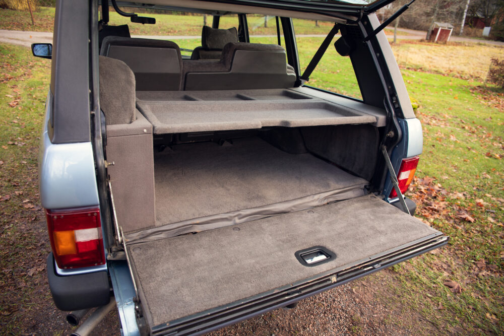 Open SUV trunk showing spacious empty cargo area