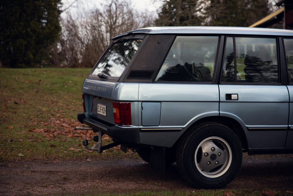 Vintage blue Range Rover parked outdoors