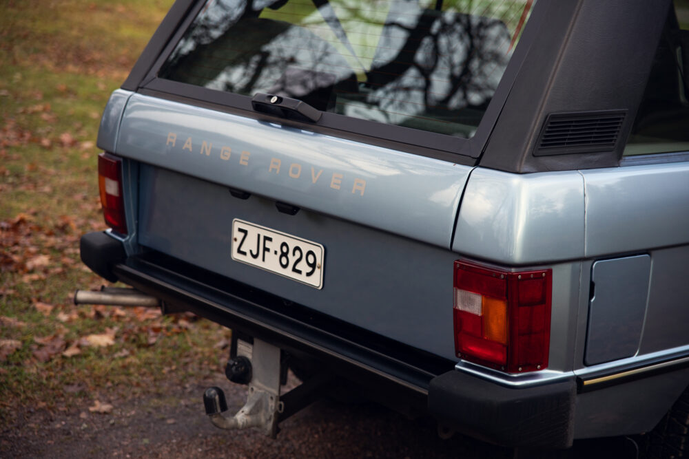 Vintage blue Range Rover rear view with license plate