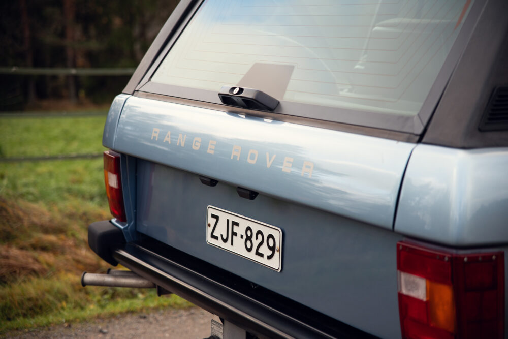 Vintage Range Rover rear view in natural setting