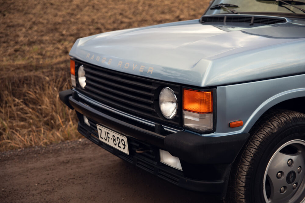 Vintage Range Rover front close-up on rural road