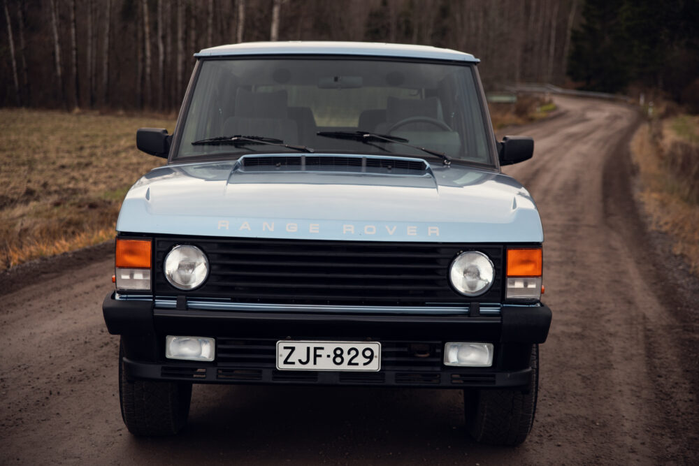 Vintage Range Rover on rural dirt road