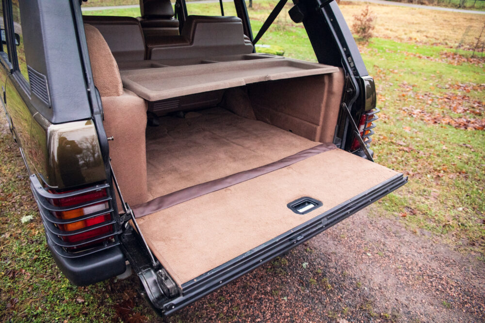 Open SUV trunk showing spacious empty cargo area