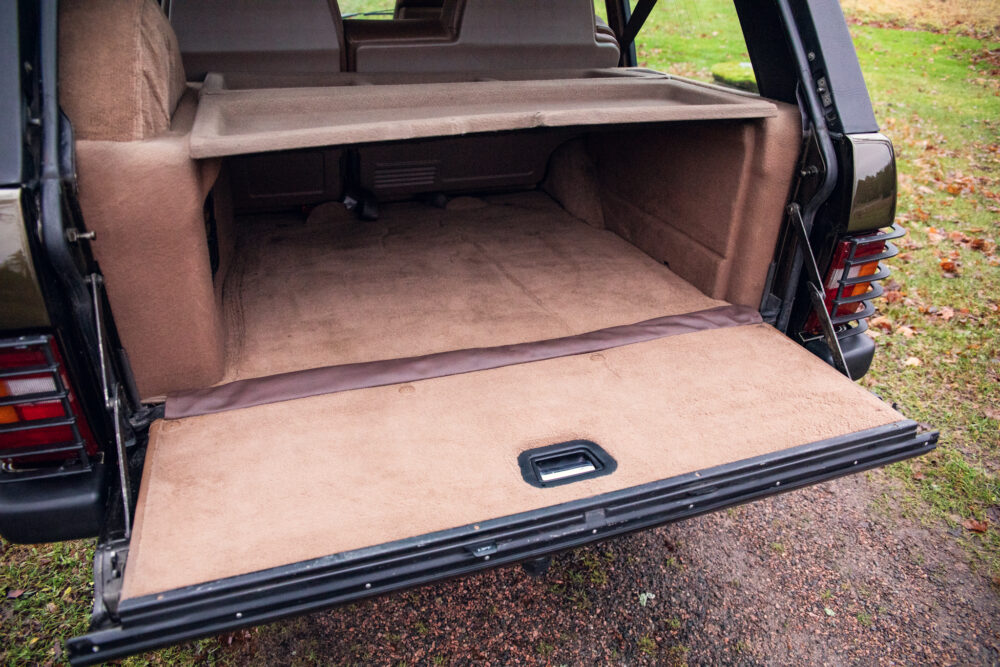 Empty open trunk of a vintage car