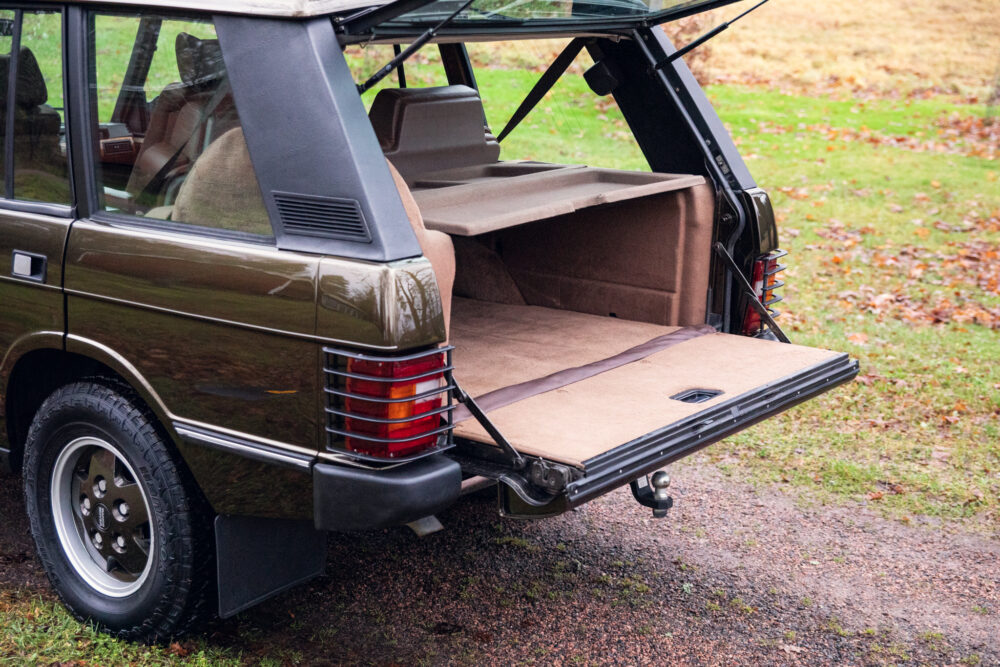 Classic car's open trunk showing empty cargo space