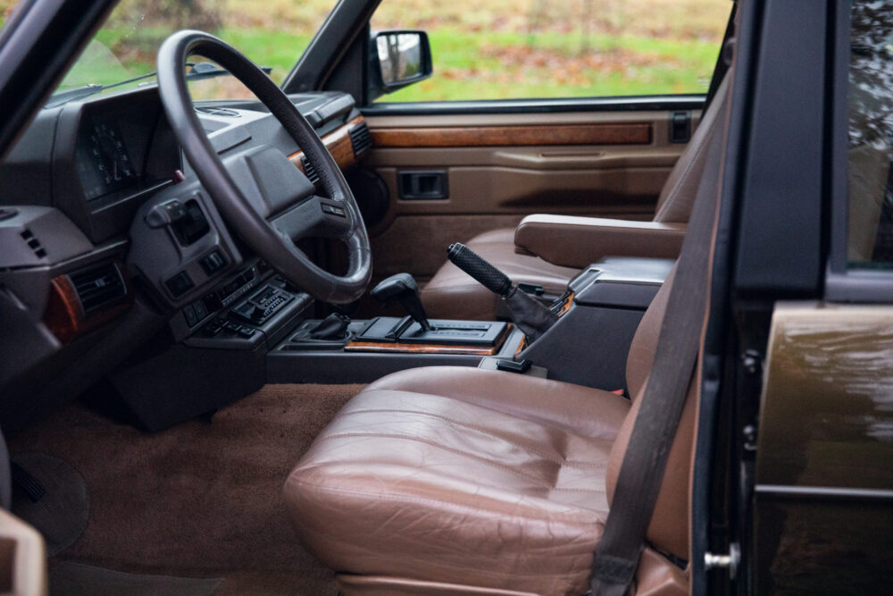 Vintage car interior with leather seats and dashboard