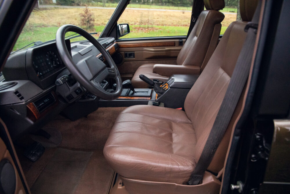 Vintage car interior with leather seats and dashboard