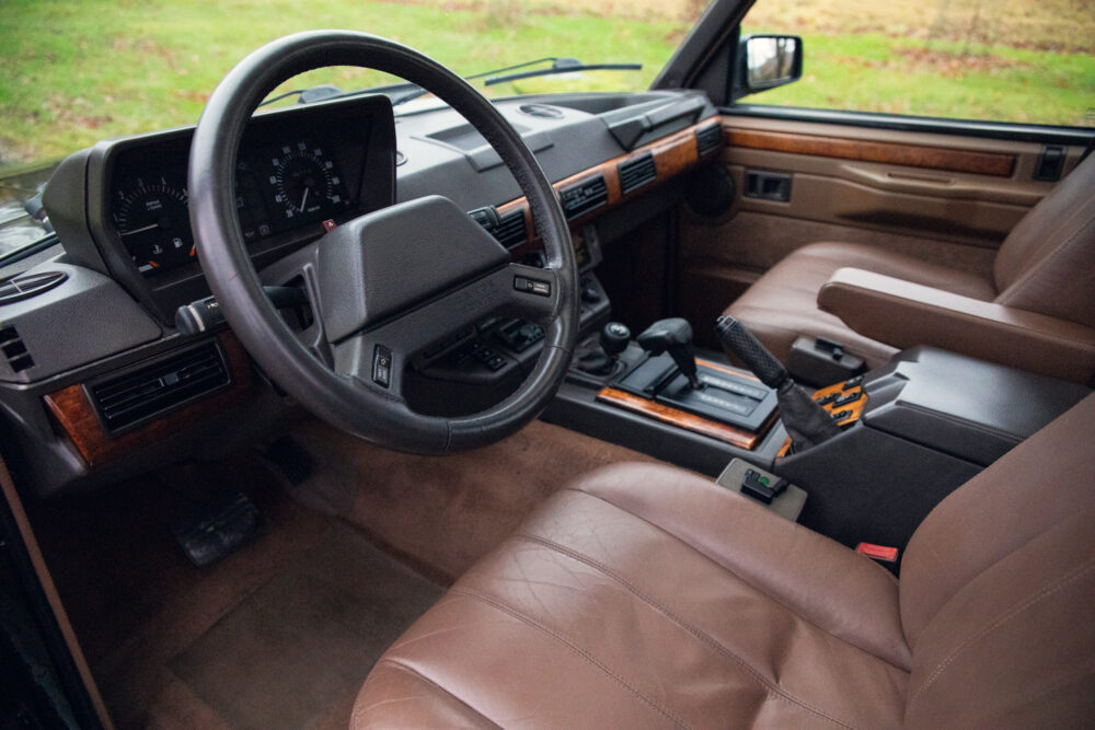 Vintage car interior with leather seats and dashboard